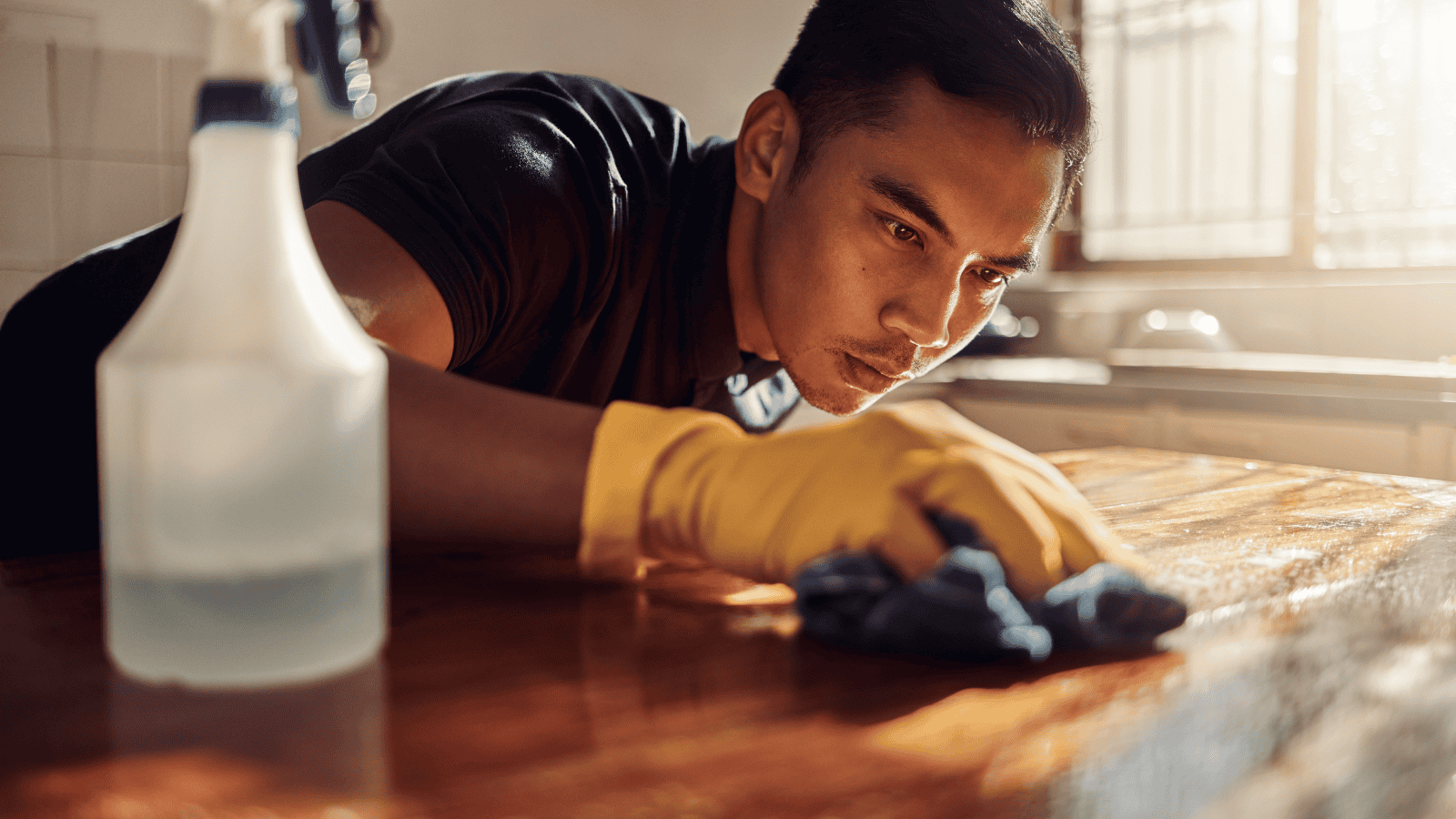 A man is obsessively cleaning