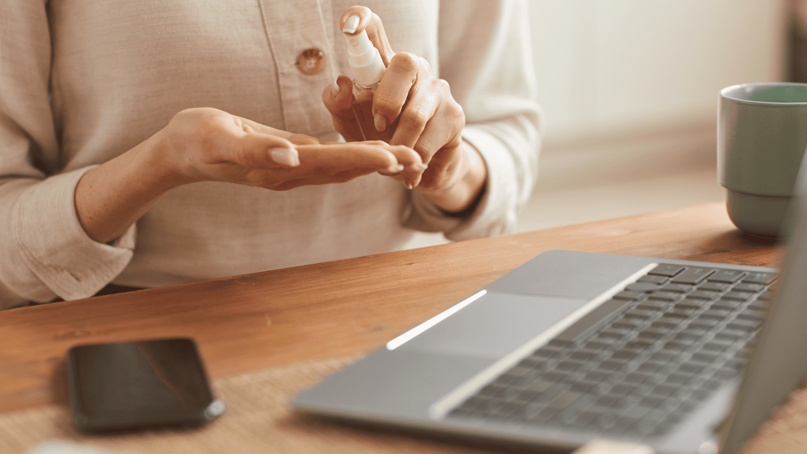 A woman with OCD is sanitizing her hands