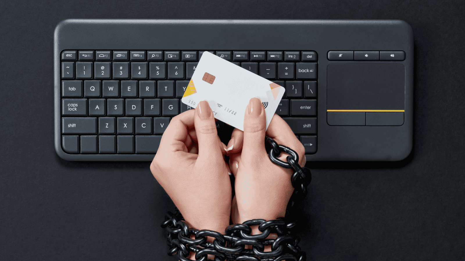 The chained hands of a shopping addict